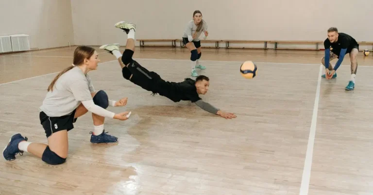 10+ Best Volleyball Knee Pads: My Top Picks for Protection! 123 Best Volleyball Knee Pads: Man dives for a volleyball while wearing Knee Pads for Volleyball