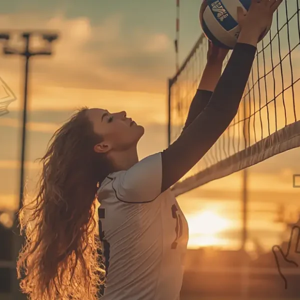 Latest Articles 4 Christian Volleyball Wallpaper where a volleyball girl standing on the net with a sunset in the background