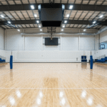 Indoor Volleyball Court 3 Wide-angle view of a pristine empty professional indoor volleyball court.